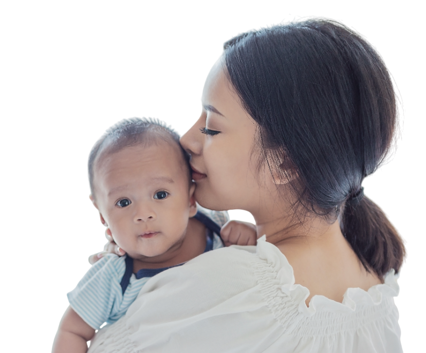 Mother kissing baby